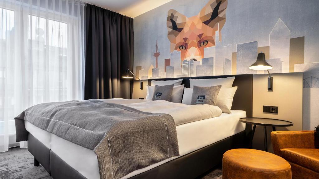 Cama ou camas em um quarto em Holiday Inn - the niu, Charly Frankfurt City by IHG