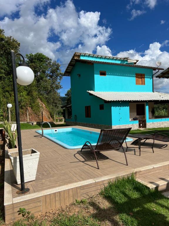 Swimmingpoolen hos eller tæt på Recanto Sonho Meu