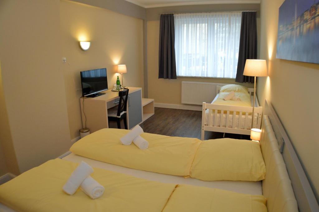 Postel nebo postele na pokoji v ubytování Hotel Jeta