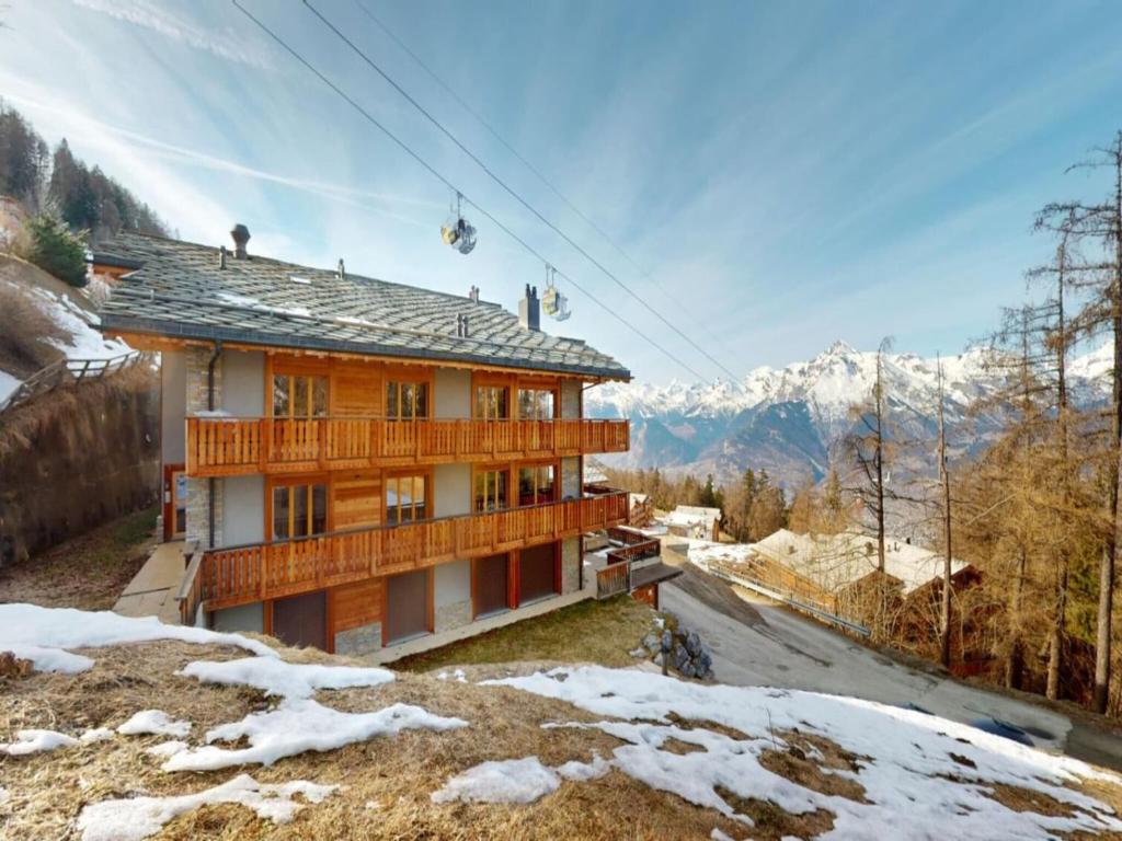 a house on a ski lift in the mountains at Centrally-located apartment for 6 in Veysonnaz
