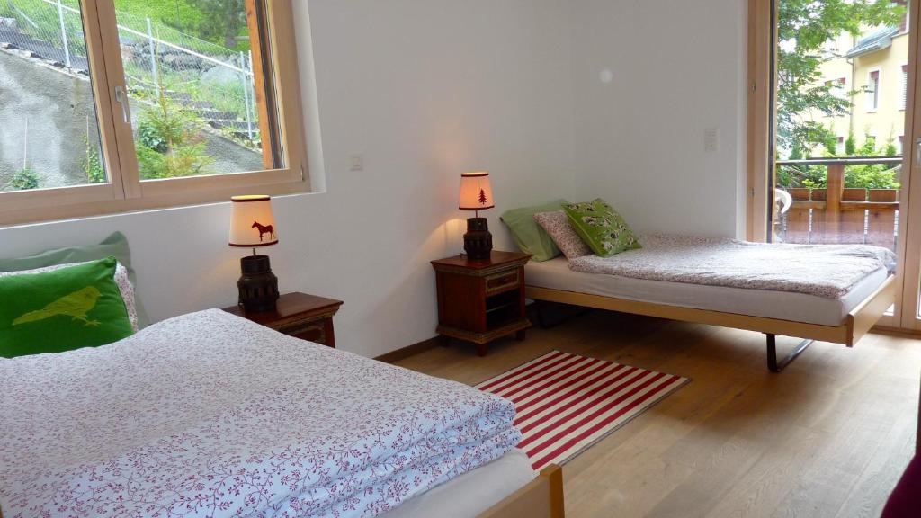 Postel nebo postele na pokoji v ubytování Hotel Mont.Lac