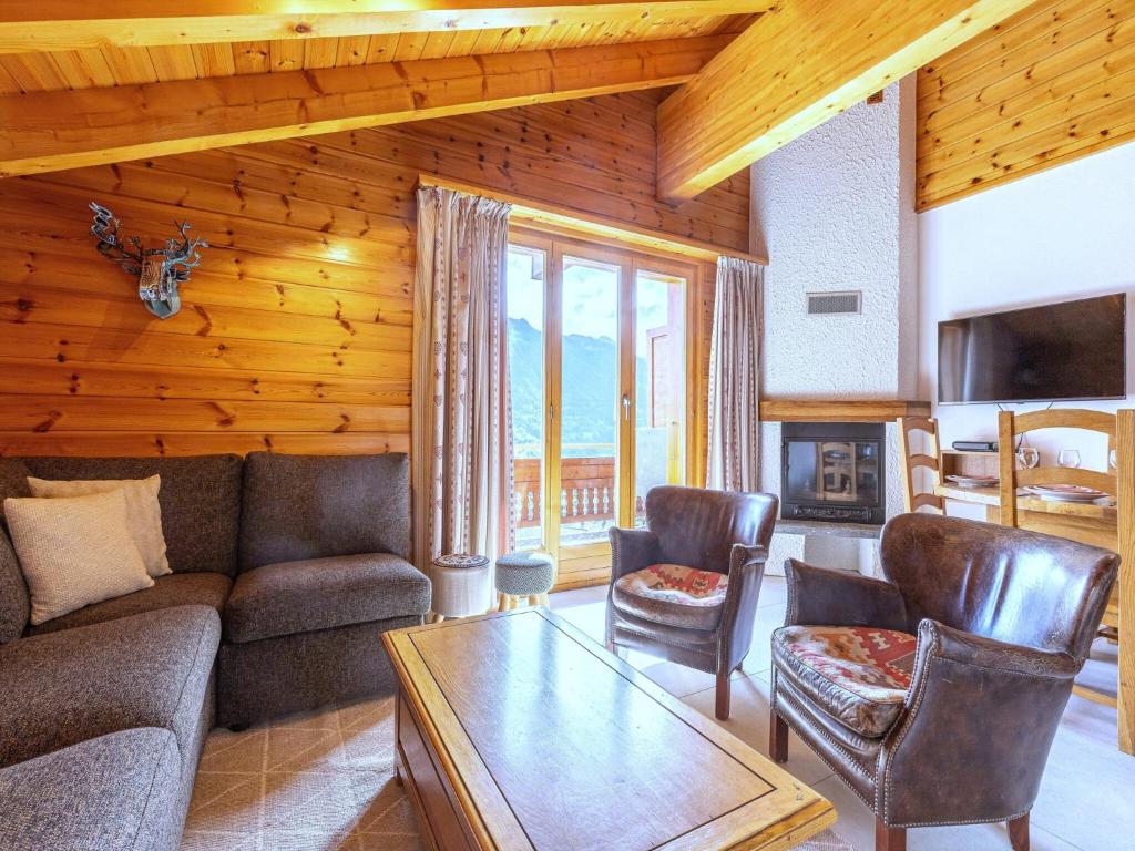 TV a/nebo společenská místnost v ubytování 3-bedroom apartment in Veysonnaz