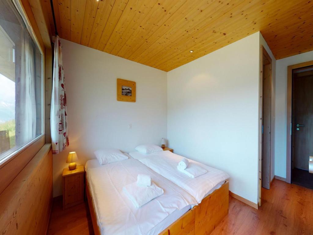 Postel nebo postele na pokoji v ubytování Cosy apartment on the slopes