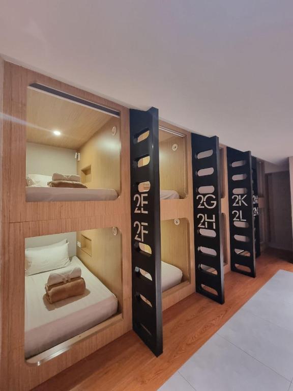 Ένα ή περισσότερα κρεβάτια σε δωμάτιο στο Moonstar Cebu Hotel