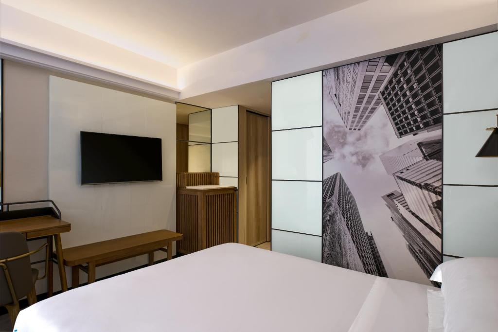 TV a/nebo společenská místnost v ubytování Sheraton Hong Kong Hotel & Towers