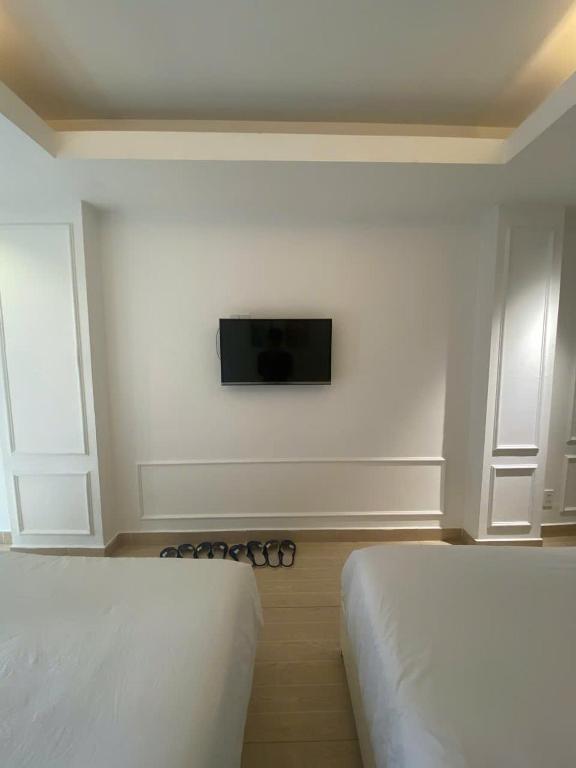 TV a/nebo společenská místnost v ubytování TwoLand Hotels & Spa