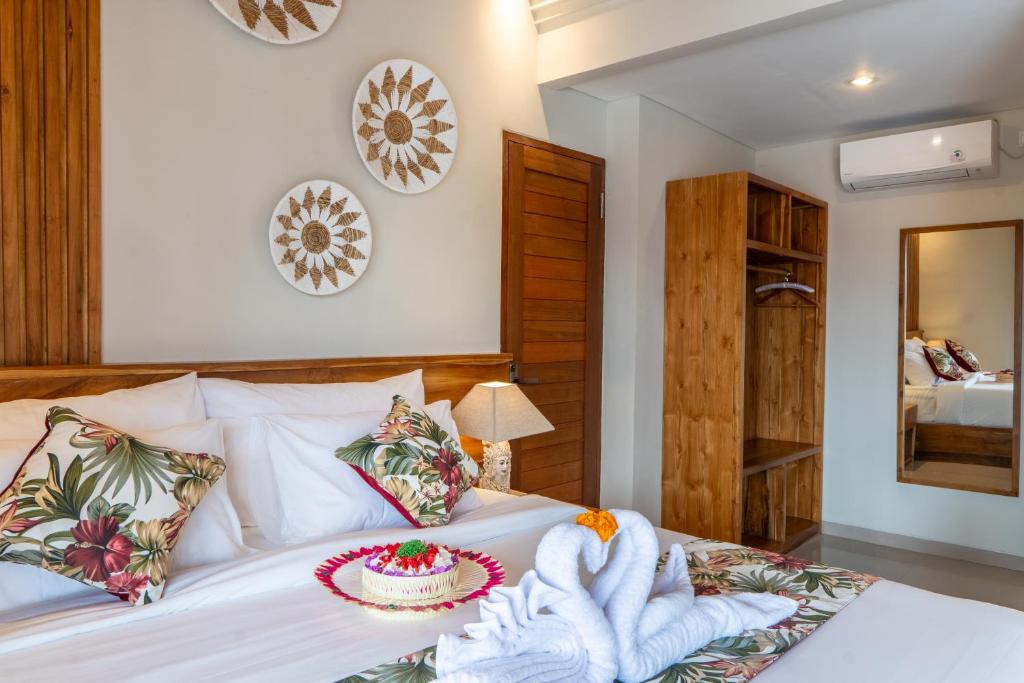 Postel nebo postele na pokoji v ubytování Meranggi Home Stay