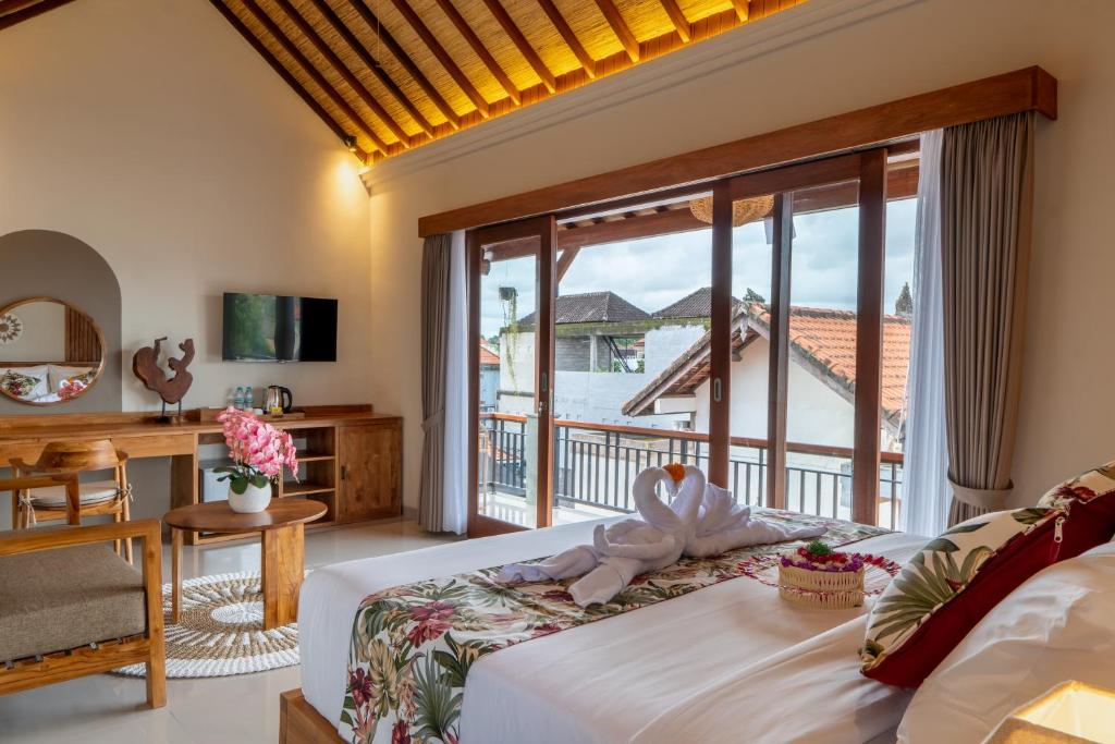 Postel nebo postele na pokoji v ubytování Meranggi Home Stay