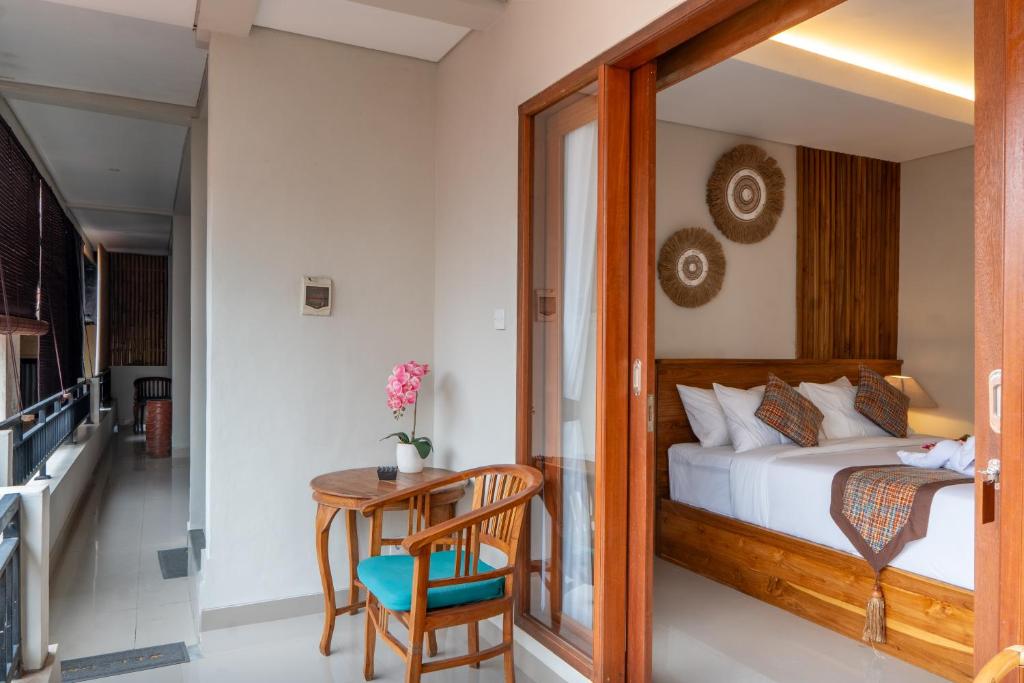 Postel nebo postele na pokoji v ubytování Meranggi Home Stay