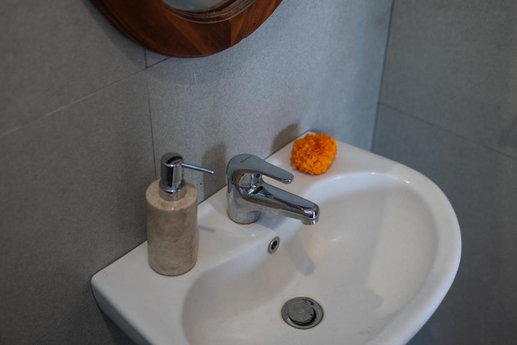 Koupelna v ubytování Meranggi Home Stay