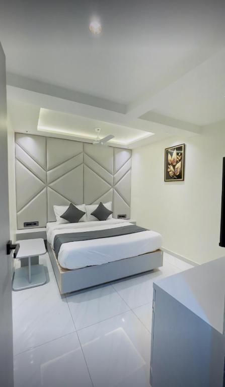 Postel nebo postele na pokoji v ubytování Hotel Skyland