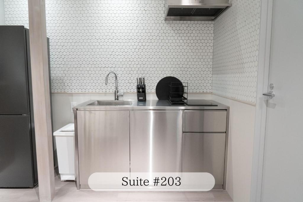 Kuchyň nebo kuchyňský kout v ubytování UNPLAN Residence suite
