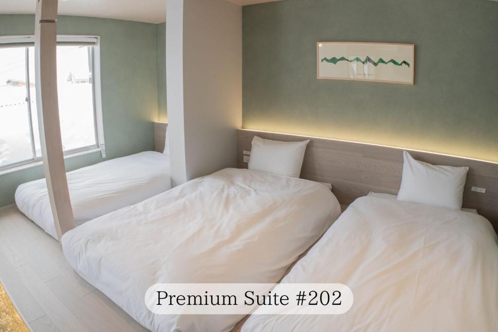 Postel nebo postele na pokoji v ubytování UNPLAN Residence suite