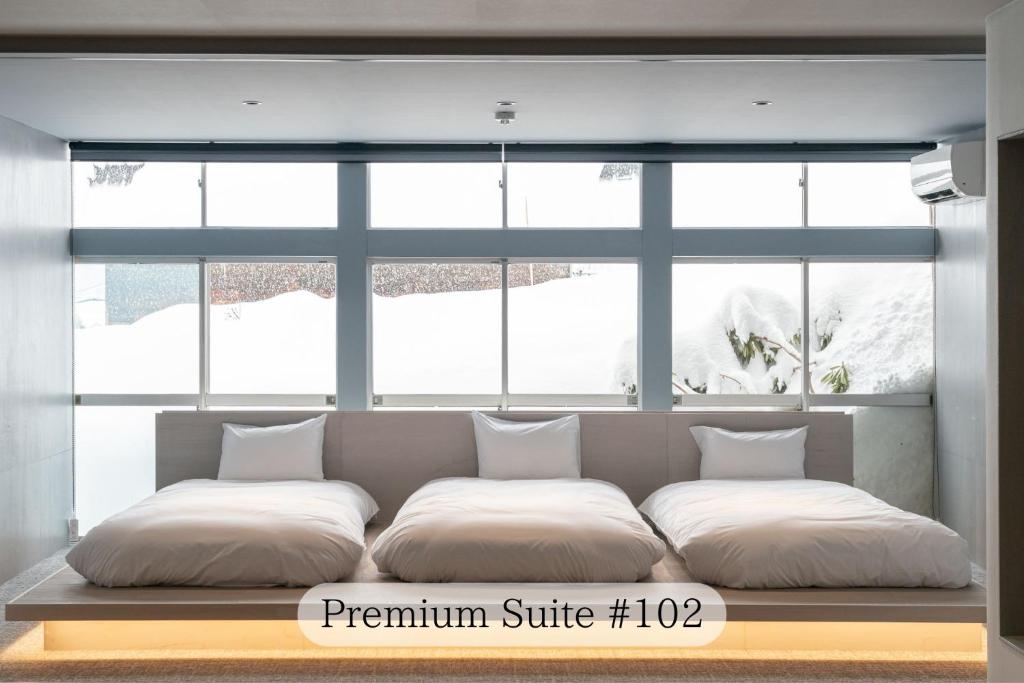Postel nebo postele na pokoji v ubytování UNPLAN Residence suite