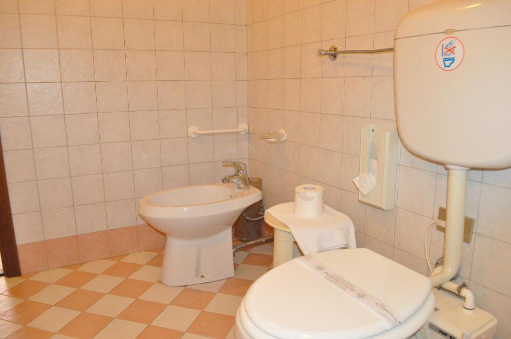Koupelna v ubytování Hotel Igea
