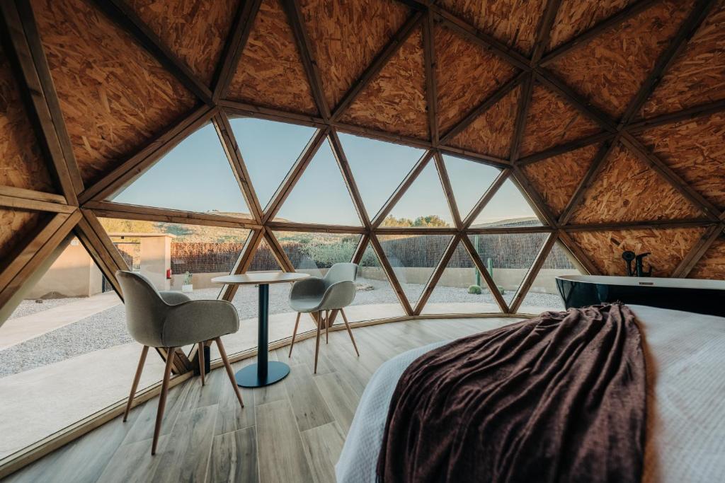 Postel nebo postele na pokoji v ubytování El Molí Glamping