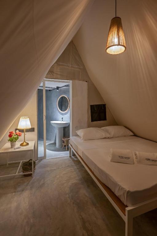 Postel nebo postele na pokoji v ubytování Manram Glamping Weligama