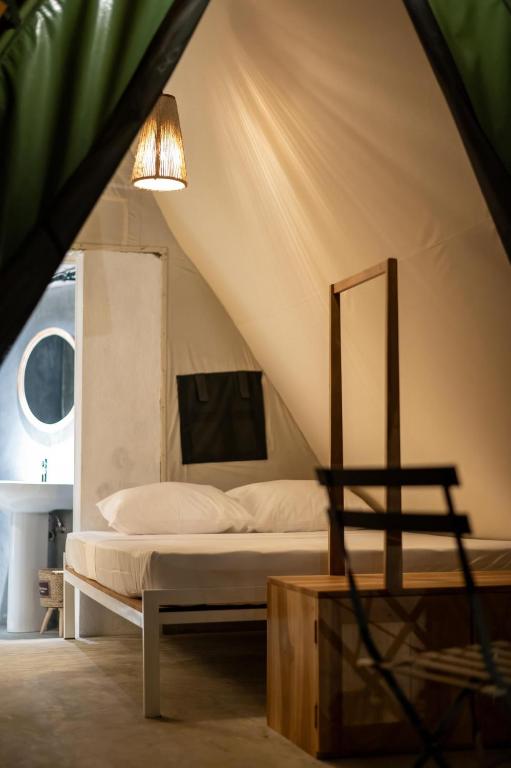 Postel nebo postele na pokoji v ubytování Manram Glamping Weligama