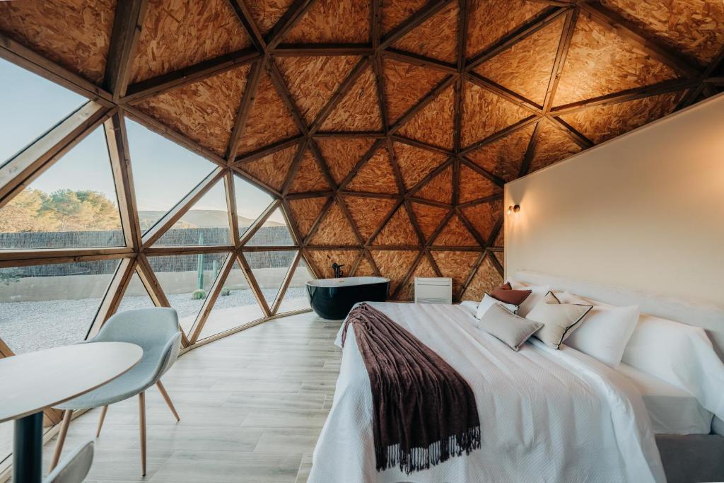 Postel nebo postele na pokoji v ubytování El Molí Glamping
