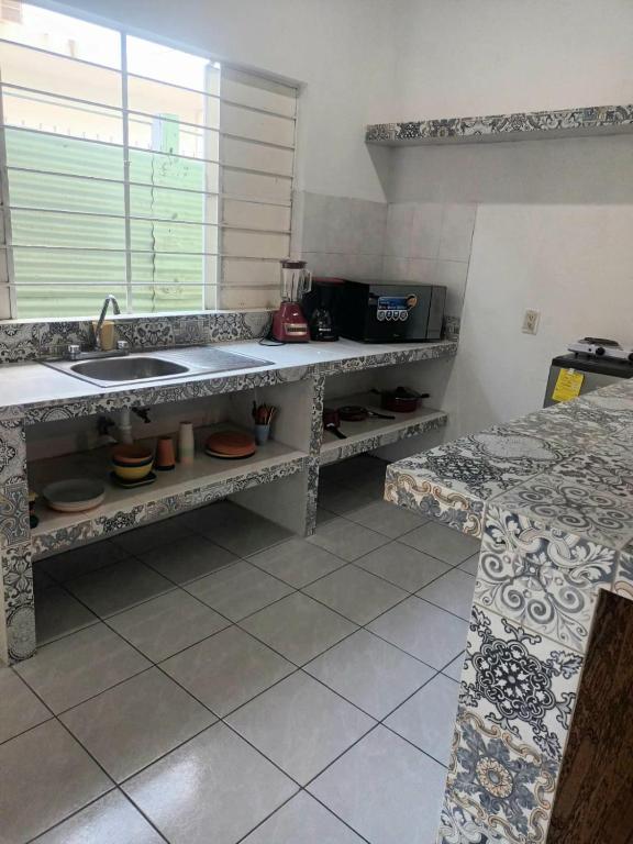 Kuchyň nebo kuchyňský kout v ubytování Villas La Vista