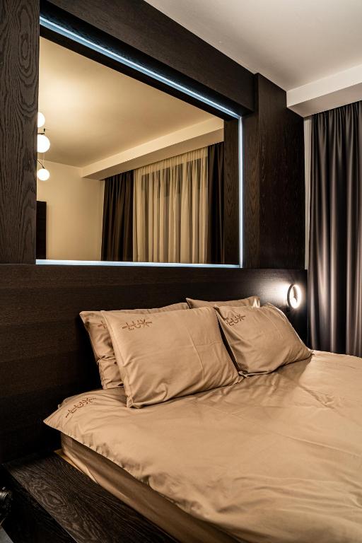 Postel nebo postele na pokoji v ubytování Brilijant Lux Apartman