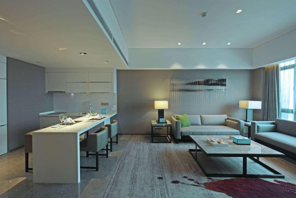 Posezení v ubytování Wyndham JinJiang Hotel
