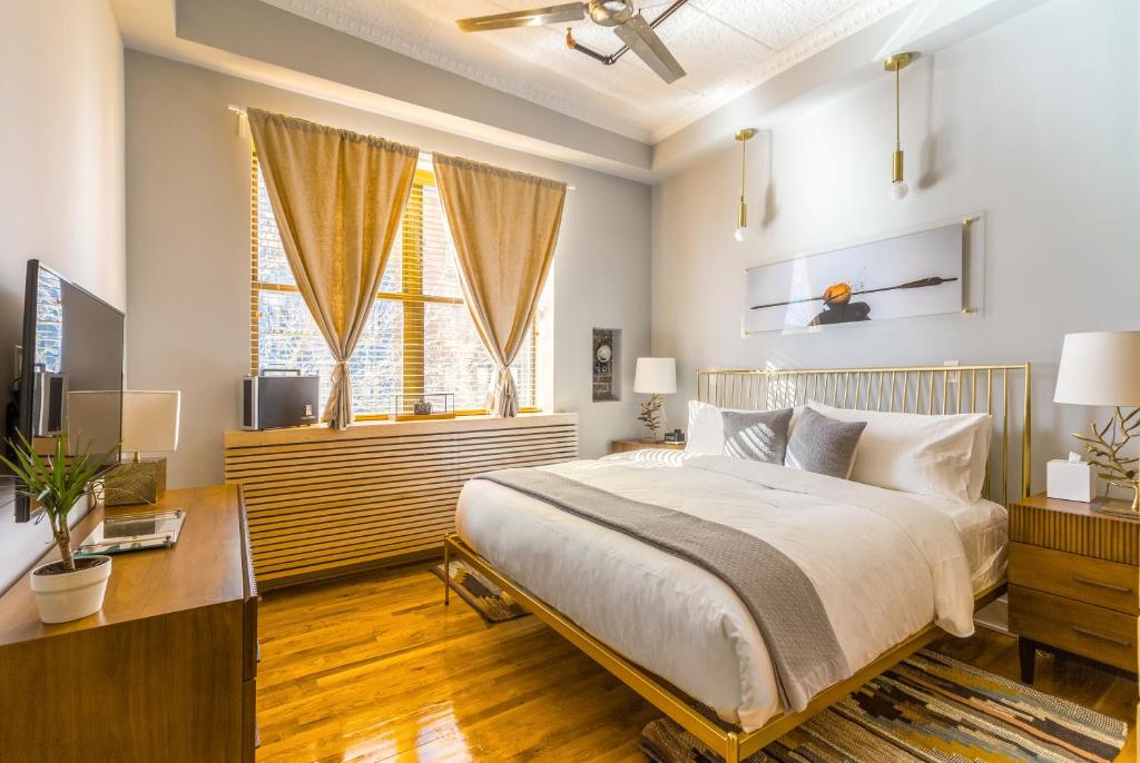Postel nebo postele na pokoji v ubytování Franklin Guesthouse
