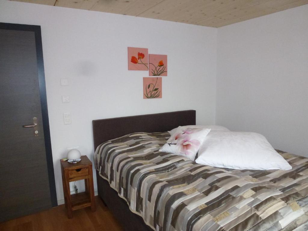 Postel nebo postele na pokoji v ubytování Hotel Enjoy