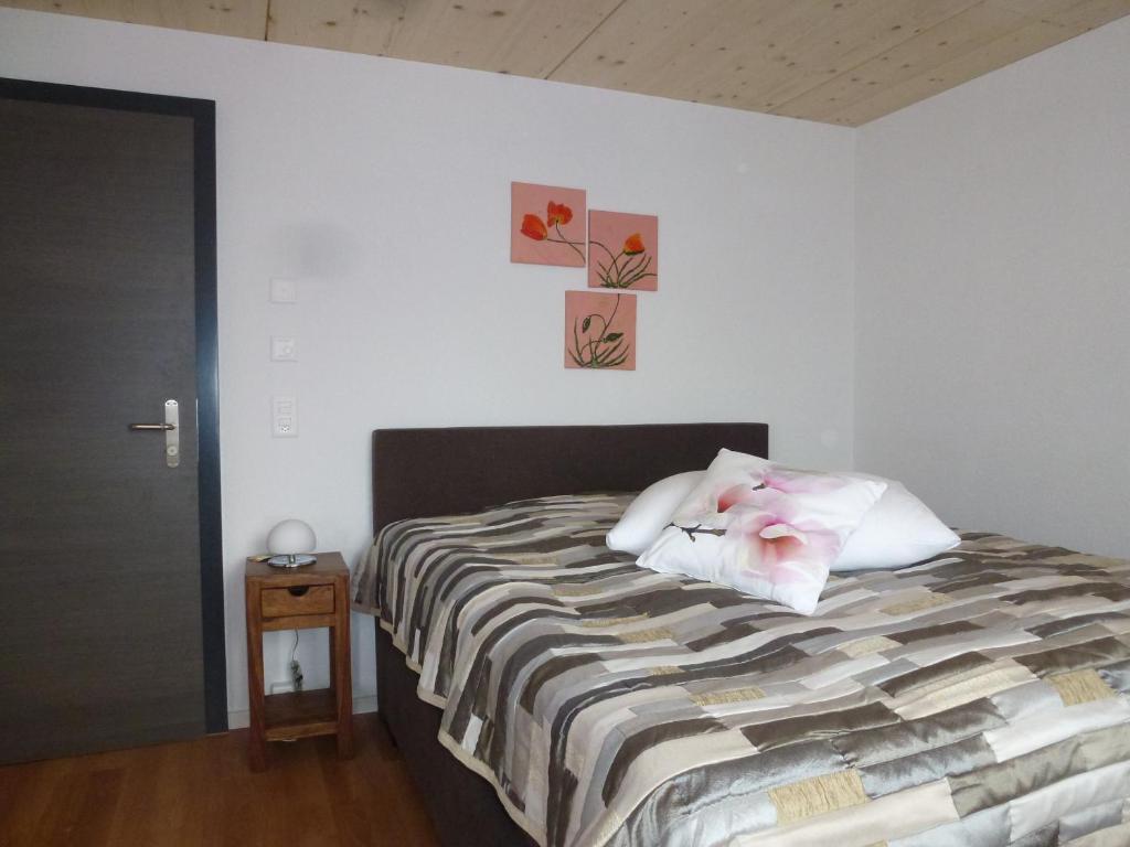 Postel nebo postele na pokoji v ubytování Hotel Enjoy