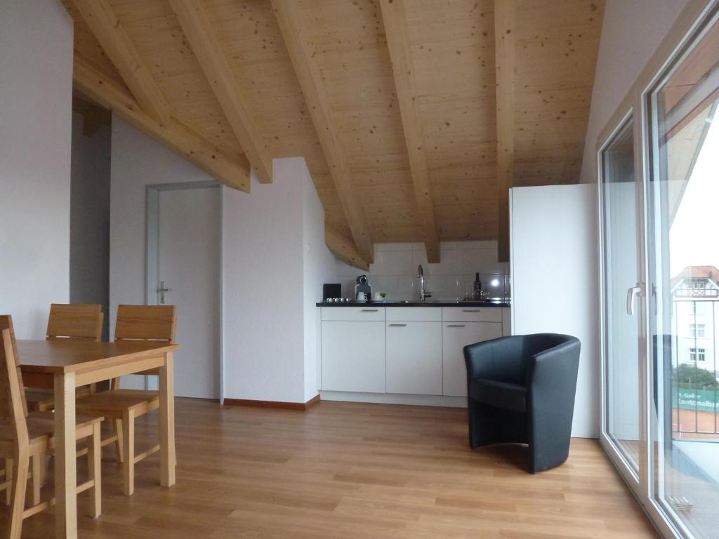Kuchyň nebo kuchyňský kout v ubytování Hotel Enjoy