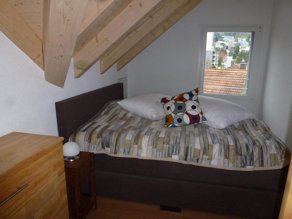 Postel nebo postele na pokoji v ubytování Hotel Enjoy