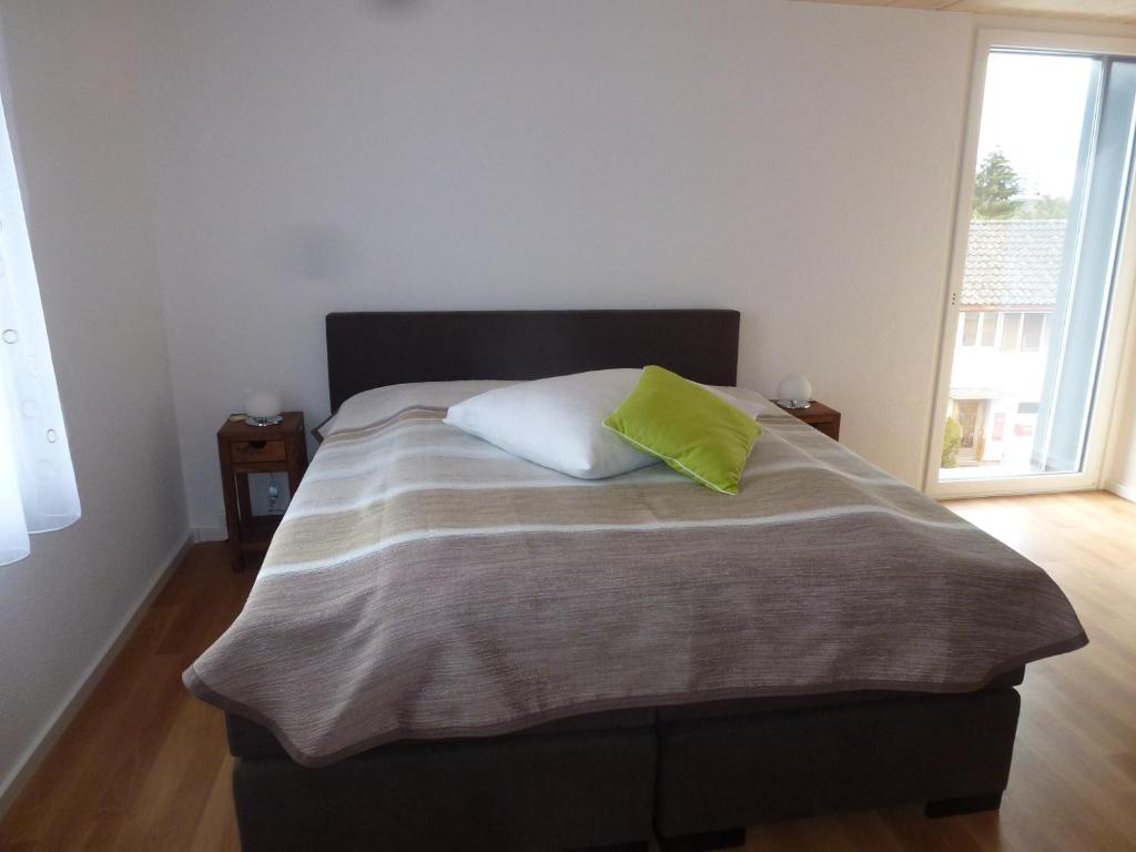 Postel nebo postele na pokoji v ubytování Hotel Enjoy