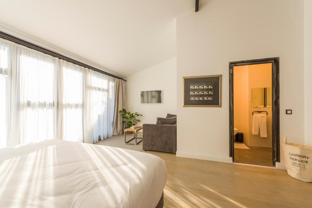 Postel nebo postele na pokoji v ubytování Fitas Oda Hotel