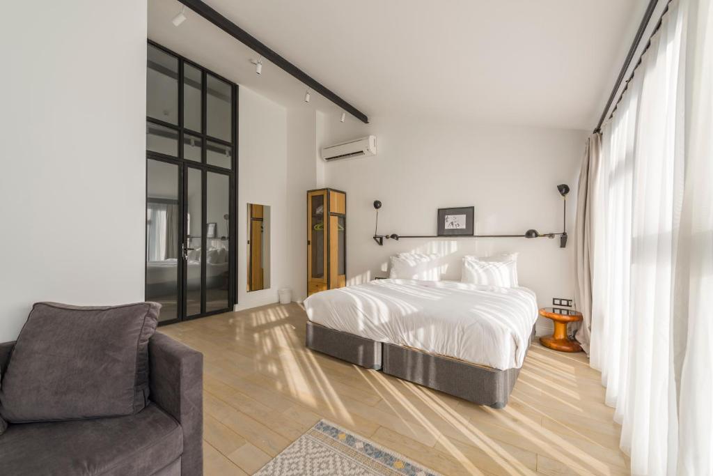 Postel nebo postele na pokoji v ubytování Fitas Oda Hotel