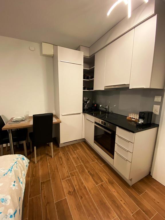 Kuchyň nebo kuchyňský kout v ubytování Aparthotel work&sleep