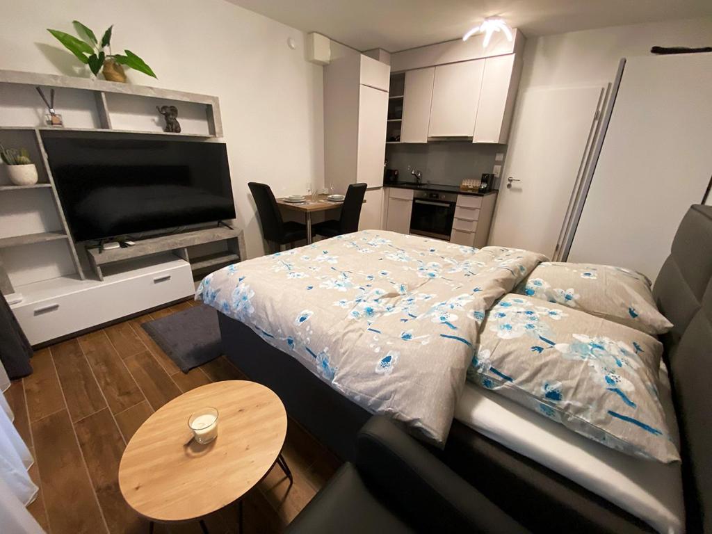 Postel nebo postele na pokoji v ubytování Aparthotel work&sleep