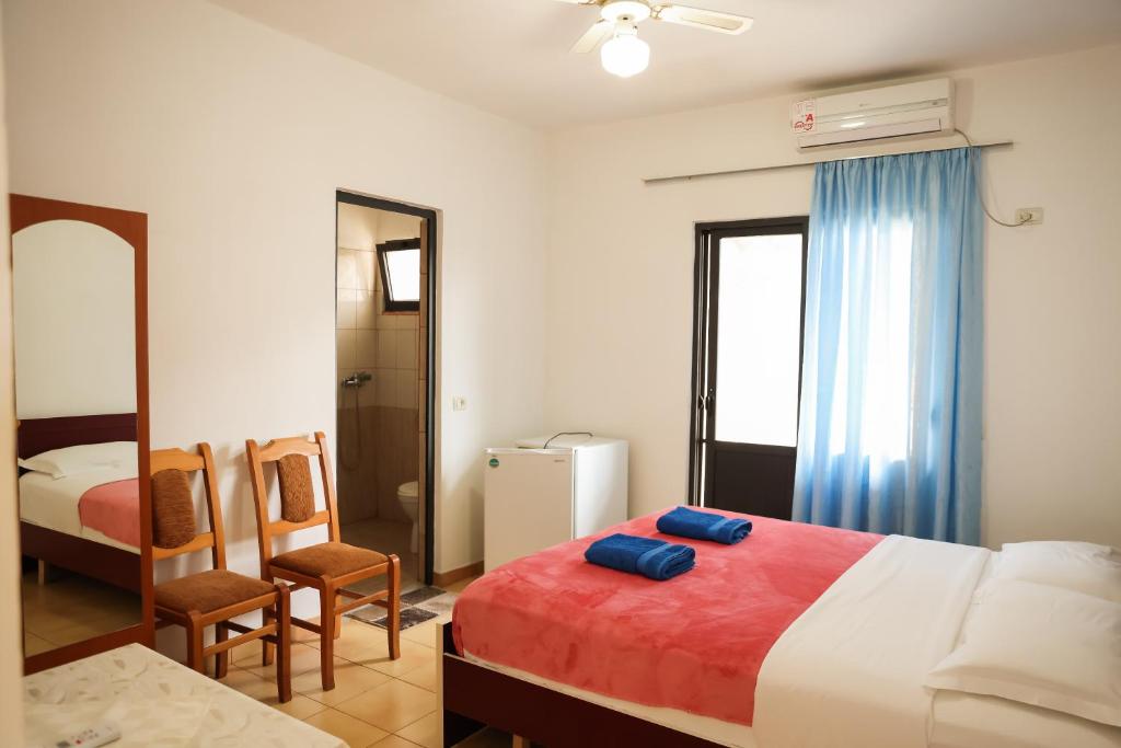 Postel nebo postele na pokoji v ubytování Haka Guesthouse