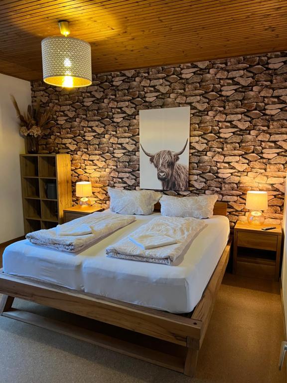 Postel nebo postele na pokoji v ubytování Bergbude
