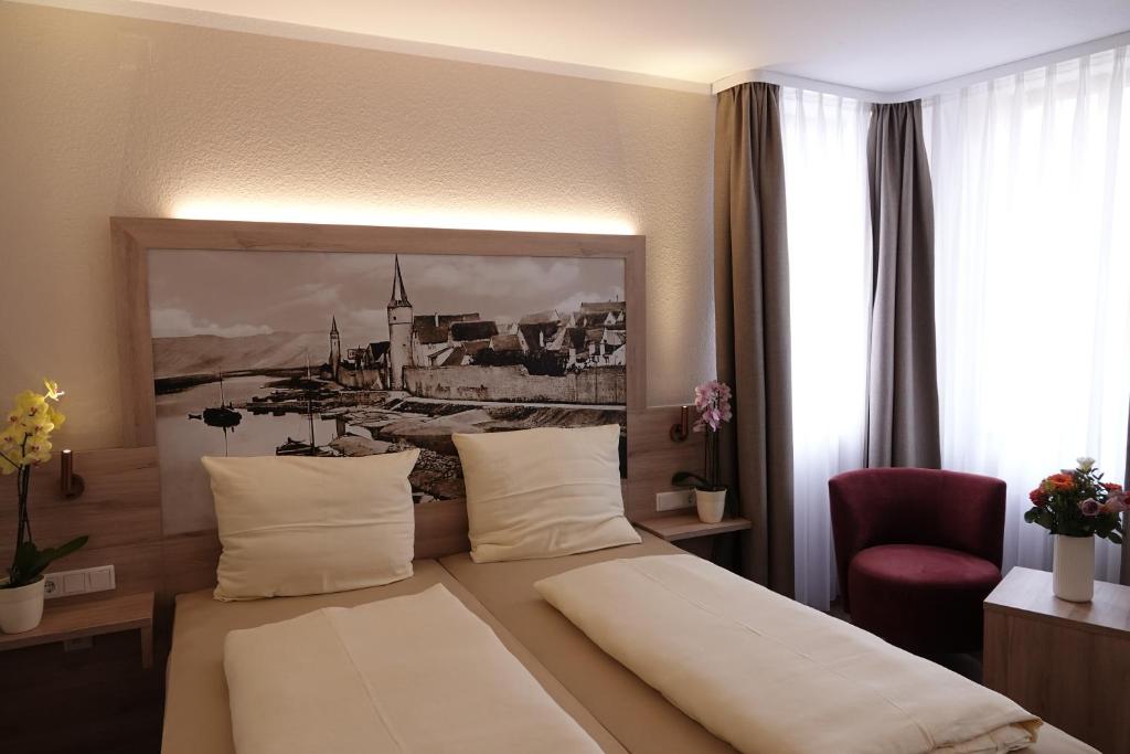 Giường trong phòng chung tại Hotel Alte Brauerei