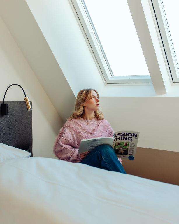 Voodi või voodid majutusasutuse Lendhotel toas
