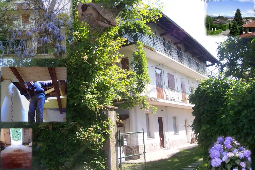 um homem está do lado de um edifício em B&B Balestruccio em Pombia