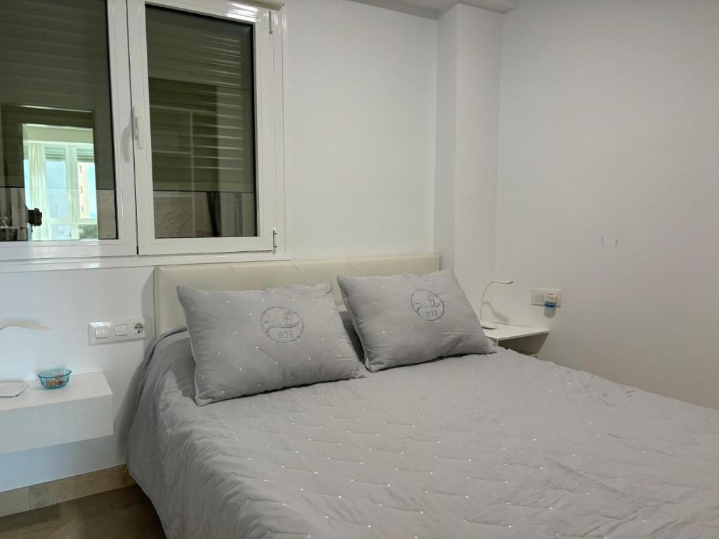 Posteľ alebo postele v izbe v ubytovaní Rentaly Holidays Apartamento Playa Almeria