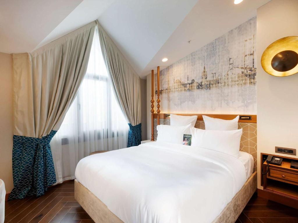 Cama ou camas em um quarto em Mercure Istanbul Sirkeci