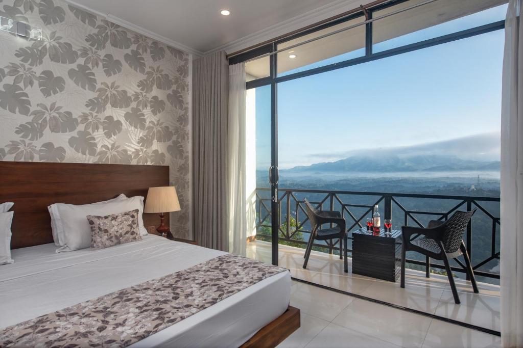 Postel nebo postele na pokoji v ubytování Ceyloni Panorama Resort