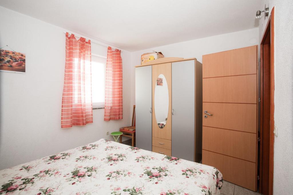 Posteľ alebo postele v izbe v ubytovaní Apartments Vrgada