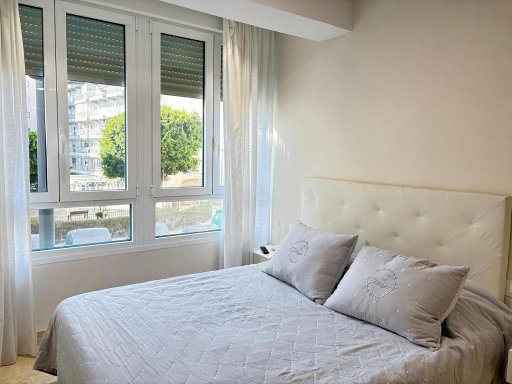 Posteľ alebo postele v izbe v ubytovaní Rentaly Holidays Apartamento Playa Almeria