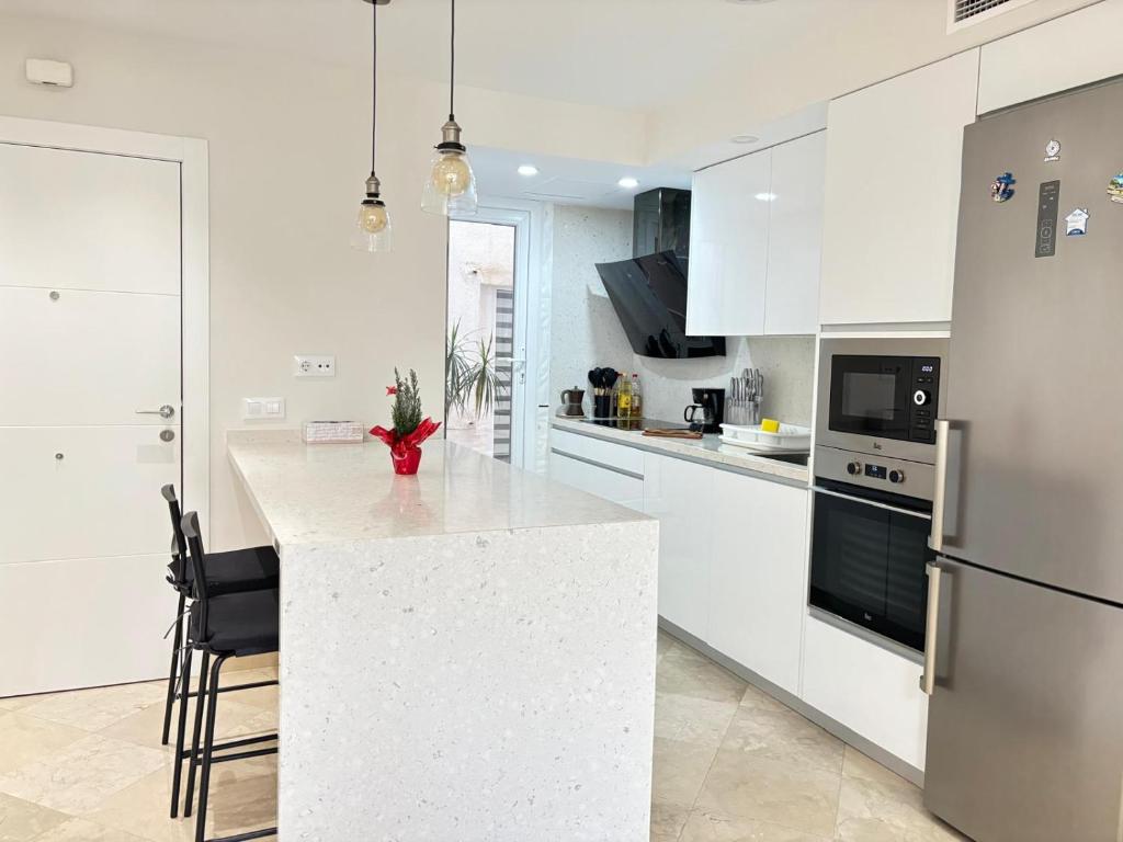 Kuchyňa alebo kuchynka v ubytovaní Rentaly Holidays Apartamento Playa Almeria