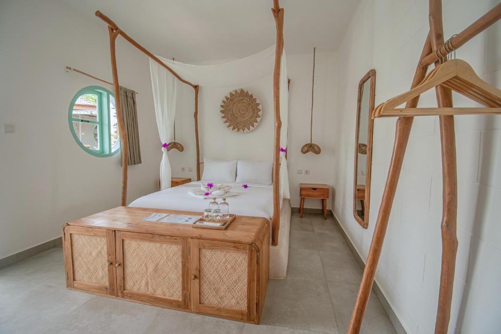 Postel nebo postele na pokoji v ubytování Quma Boutique Hotel - Adults Only