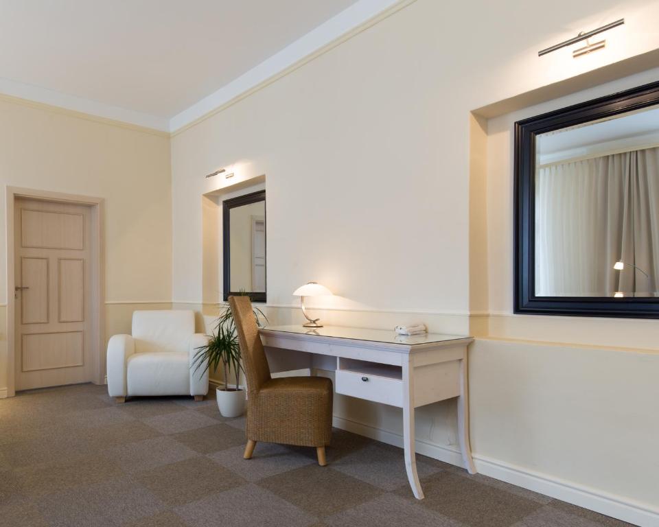 Posezení v ubytování Unitas Hotel