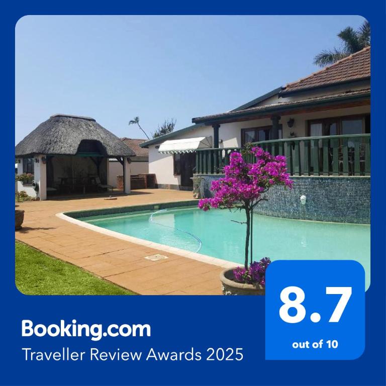 a picture of a swimming pool in a house at Bleu Bird Guesthouse in Durban